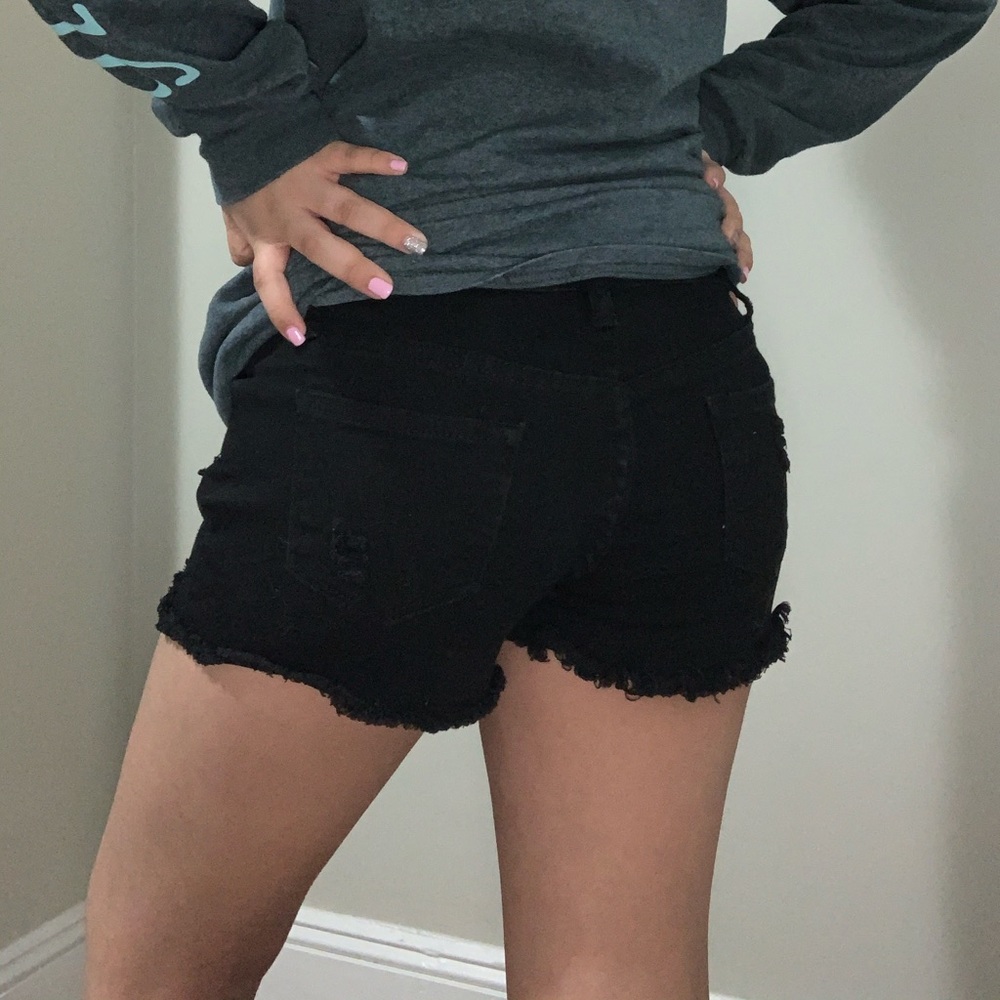 Black ripped jean shorts